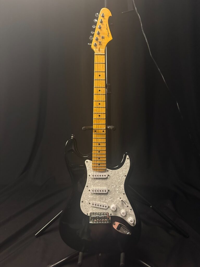 Vintage Spectrum Strat-style Black and White Electric Guitar, pearloid pickguard
