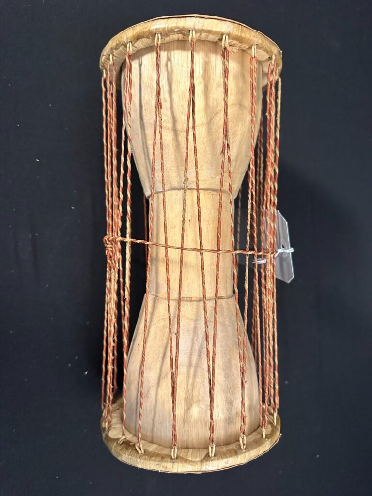 5" Talking Drum with skin heads, brown leather at stitching and ropes 10"H