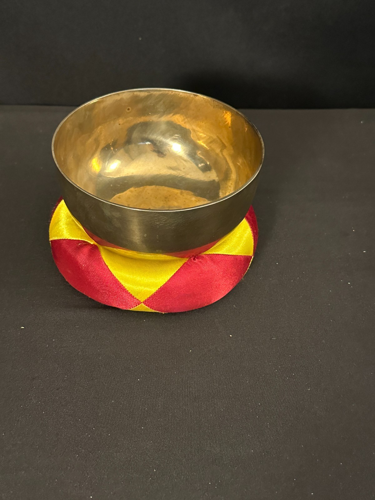 5" Brass singing bowl with red and yellow cushion, 2.5" deep, NO BEATER