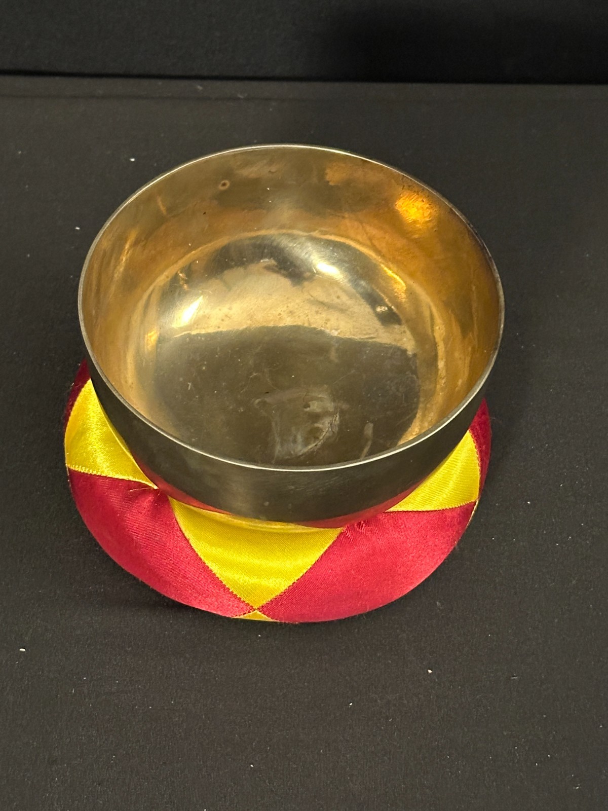 5" Brass singing bowl with red and yellow cushion, 2.5" deep, NO BEATER - Image 2