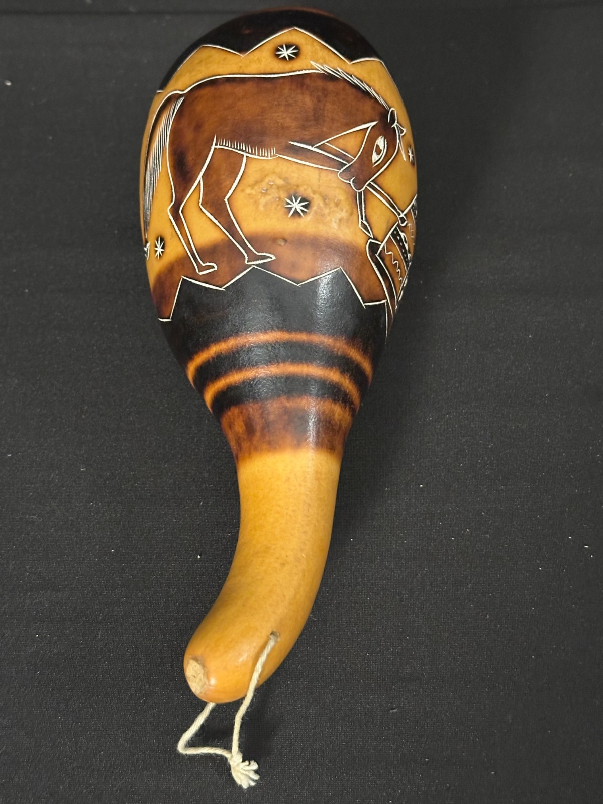 8" unbranded gourd shaker, brown, black, lots of detail work