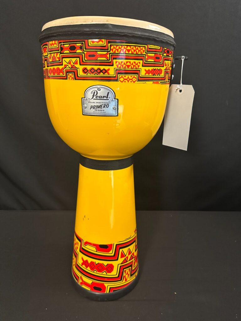 Pearl Primero Series Djembe 9" x 22" tall Yellow, red, and black, plastic head