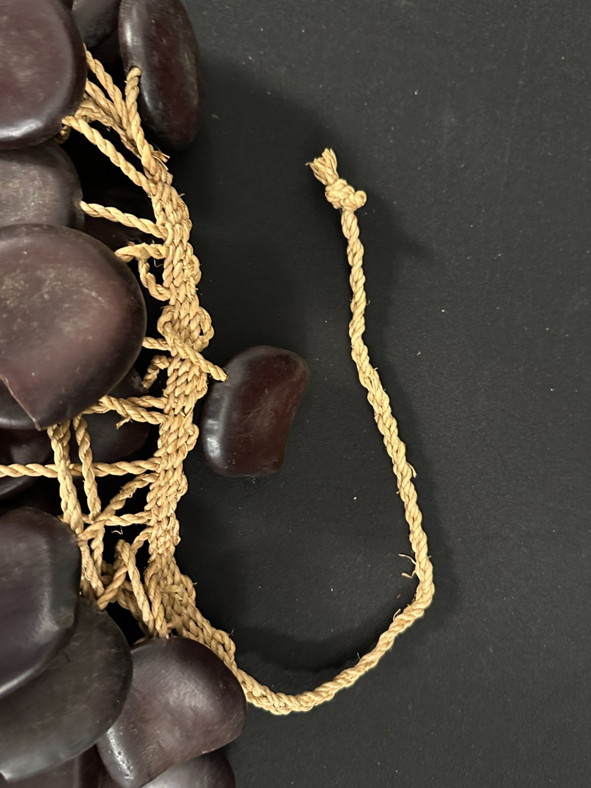 Pair of Seed Pod shakers, dark brown, made in Cameroon, attached on woven rope - Image 2