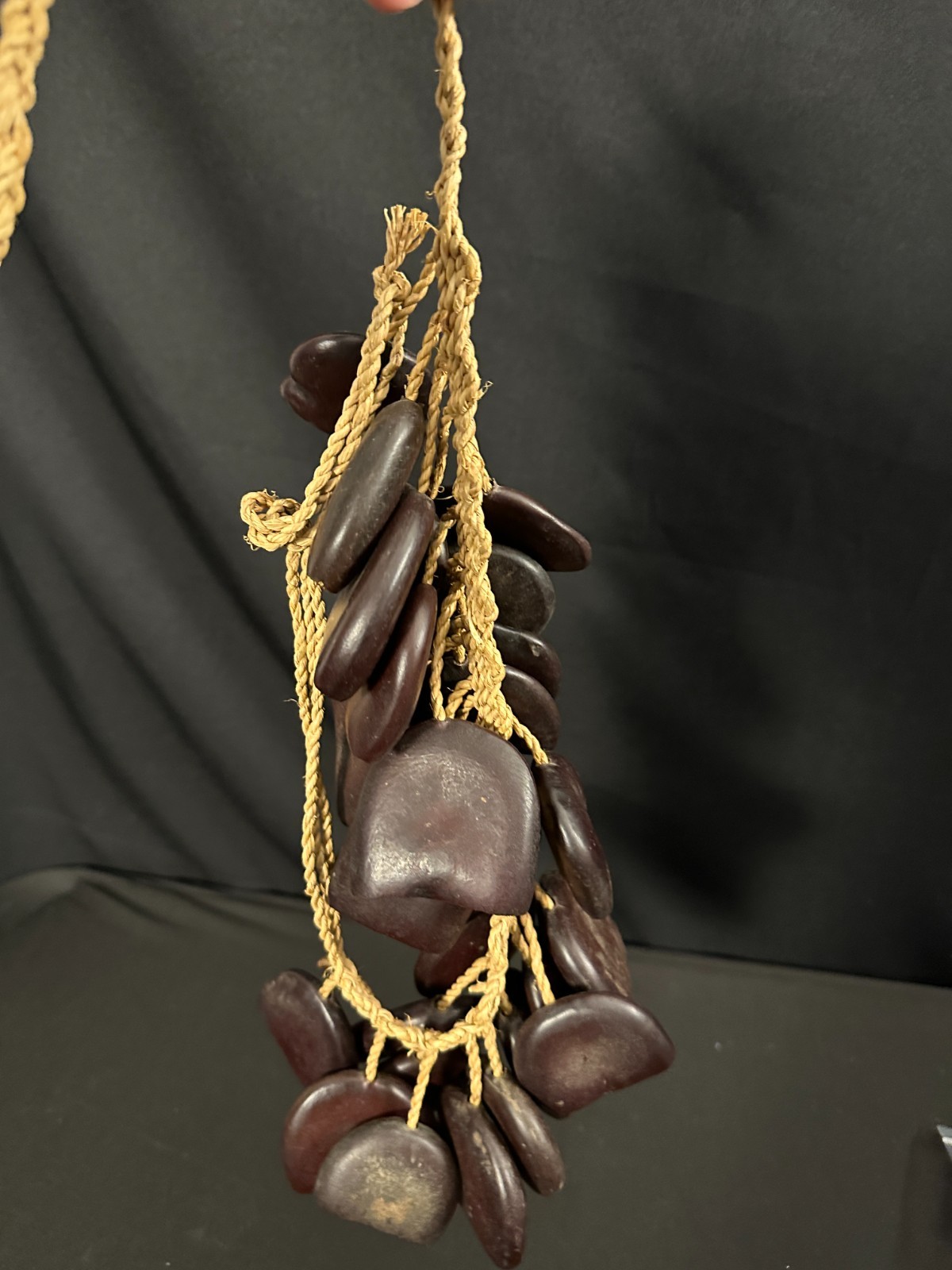Pair of Seed Pod shakers, dark brown, made in Cameroon, attached on woven rope - Image 3