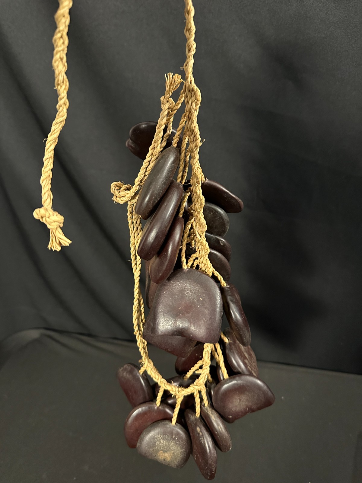 Pair of Seed Pod shakers, dark brown, made in Cameroon, attached on woven rope - Image 4