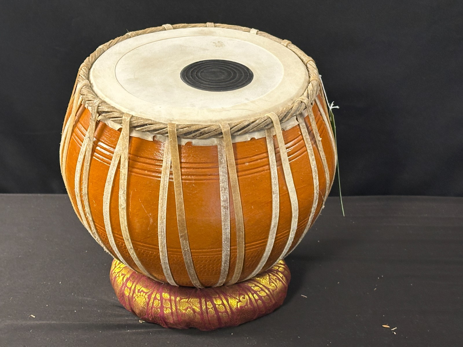 9" diameter Bayan from tabla set, drum is 11" tall, comes with 2" red cushion.