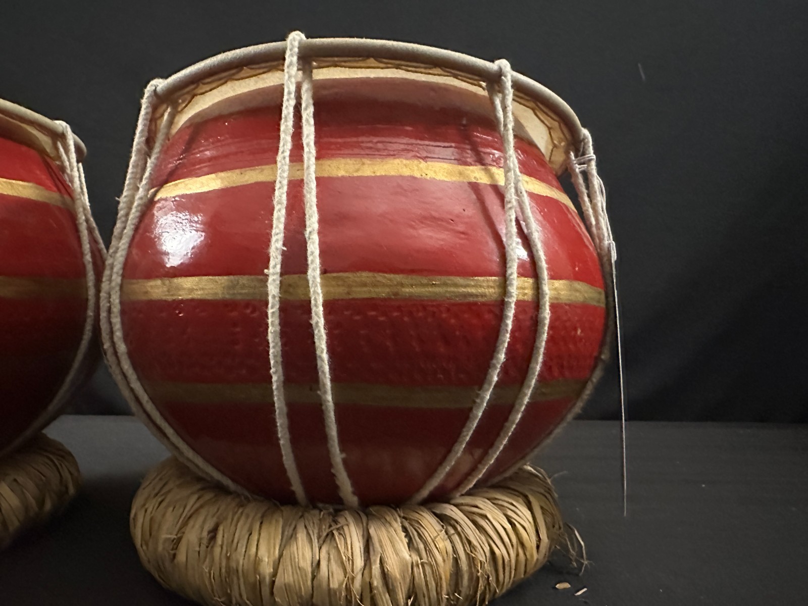 9" diameter pair of hand red and painted hand drums, low and high, w/ cushions. - Image 4
