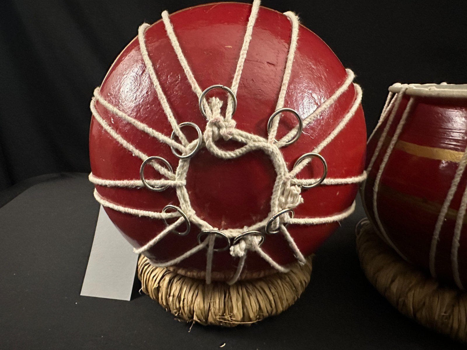 9" diameter pair of hand red and painted hand drums, low and high, w/ cushions. - Image 5